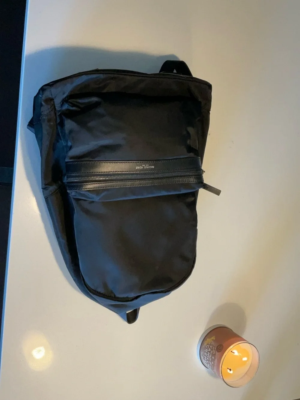 Black Michael Kors Kent Backpack. Silver hardware